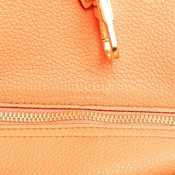 Pre-owned Gucci Small Pebbled Calfskin Logo Convertible Tote Orange