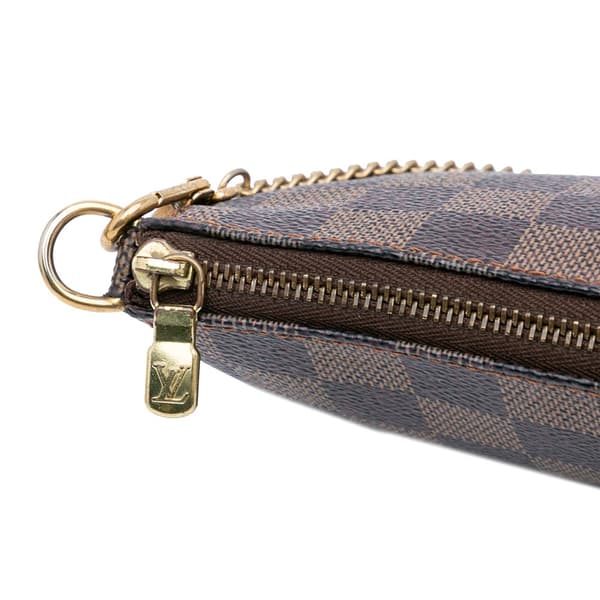 Pre-owned Louis Vuitton Damier Ebene Mini Pochette Accessoires Brown