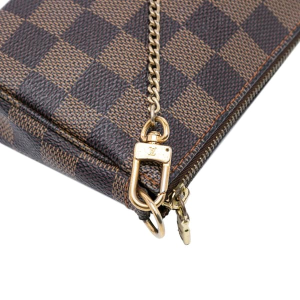 Pre-owned Louis Vuitton Damier Ebene Mini Pochette Accessoires Brown