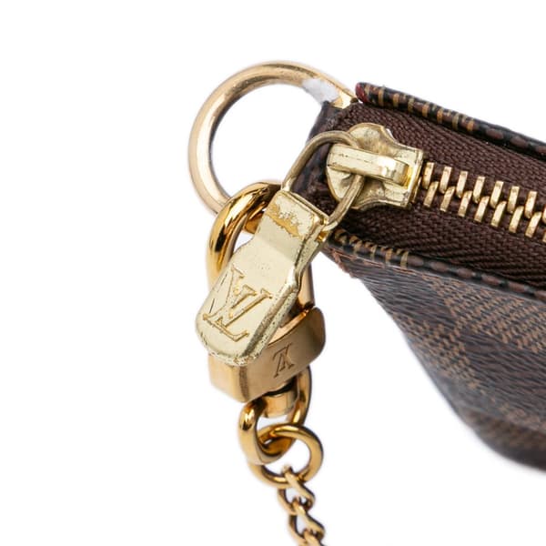 Pre-owned Louis Vuitton Damier Ebene Mini Pochette Accessoires Brown