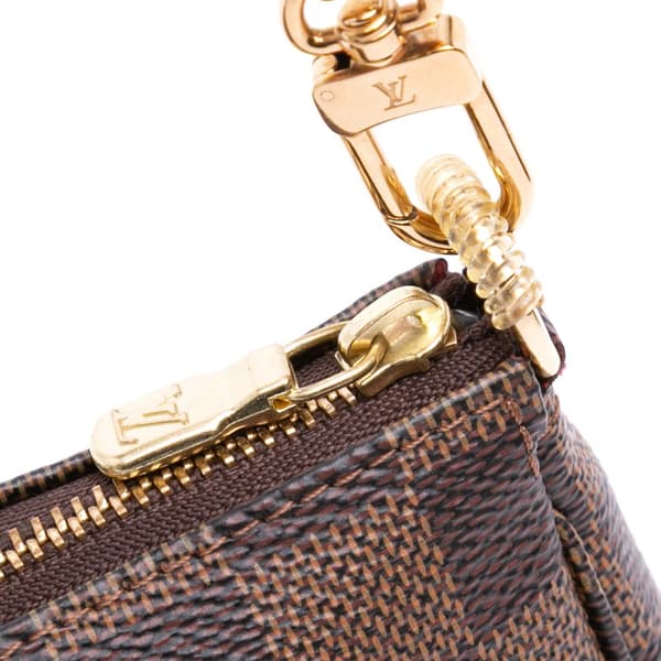 Pre-owned Louis Vuitton Damier Ebene Mini Pochette Accessoires Brown