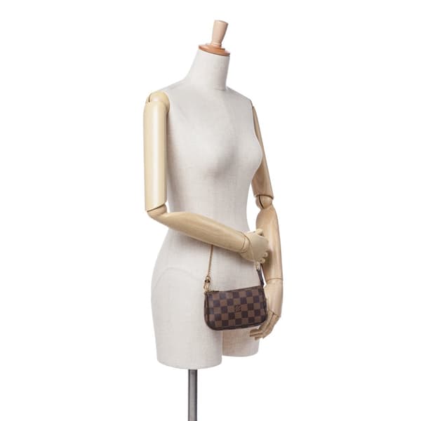 Pre-owned Louis Vuitton Damier Ebene Mini Pochette Accessoires Brown