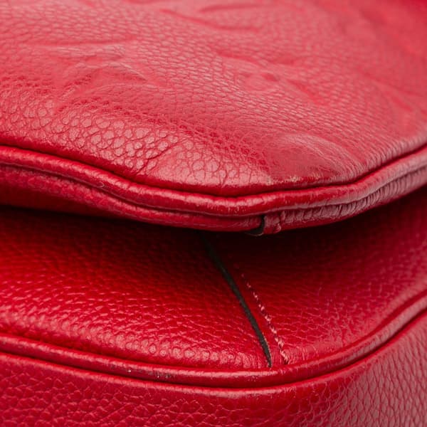 Pre-owned Louis Vuitton Monogram Empreinte Pochette Metis Red