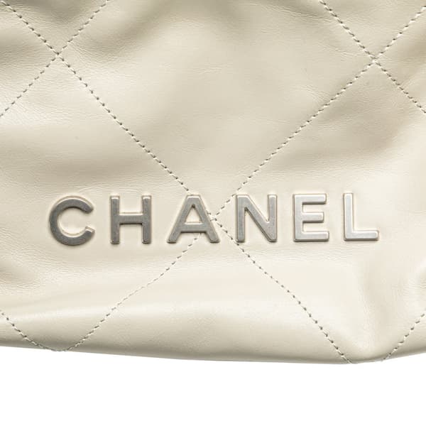 Pre-owned Chanel Mini Shiny Calfskin 22 Handbag Brown