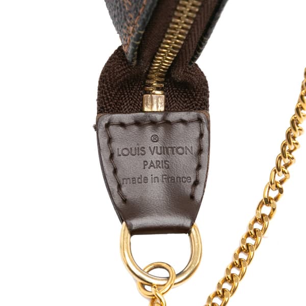 Pre-owned Louis Vuitton Damier Ebene Mini Pochette Accessoires Brown