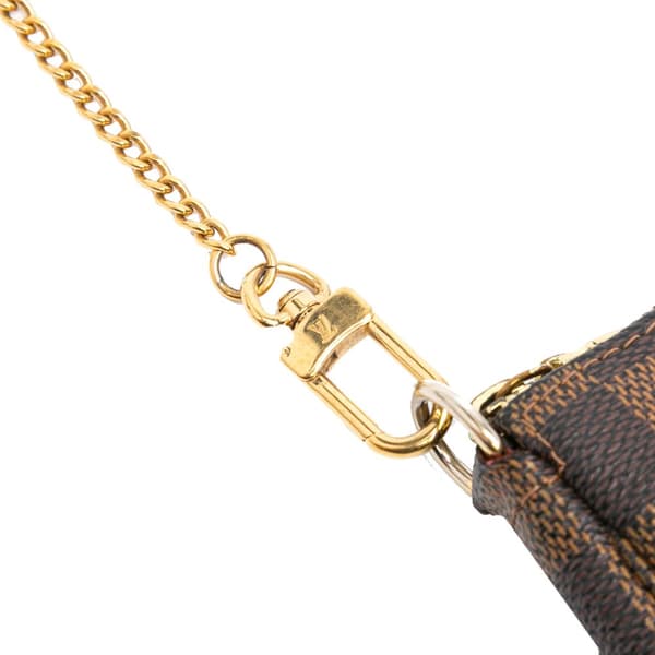 Pre-owned Louis Vuitton Damier Ebene Mini Pochette Accessoires Brown
