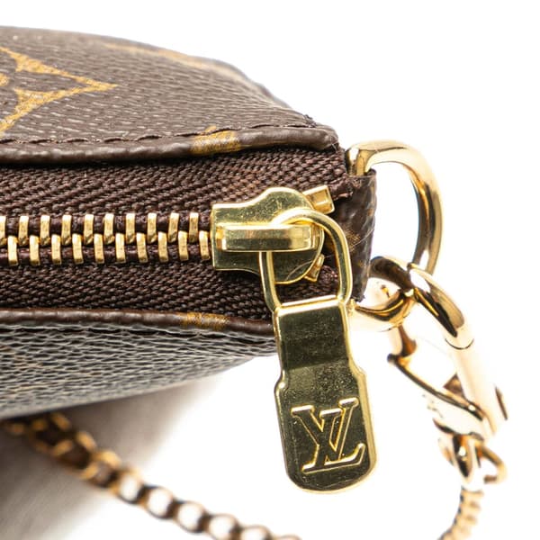 Pre-owned Louis Vuitton Monogram Mini Pochette Accessoires Brown
