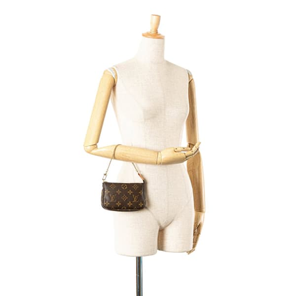 Pre-owned Louis Vuitton Monogram Mini Pochette Accessoires Brown