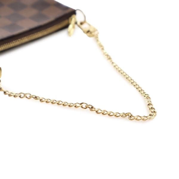 Pre-owned Louis Vuitton Damier Ebene Mini Pochette Accessoires Brown