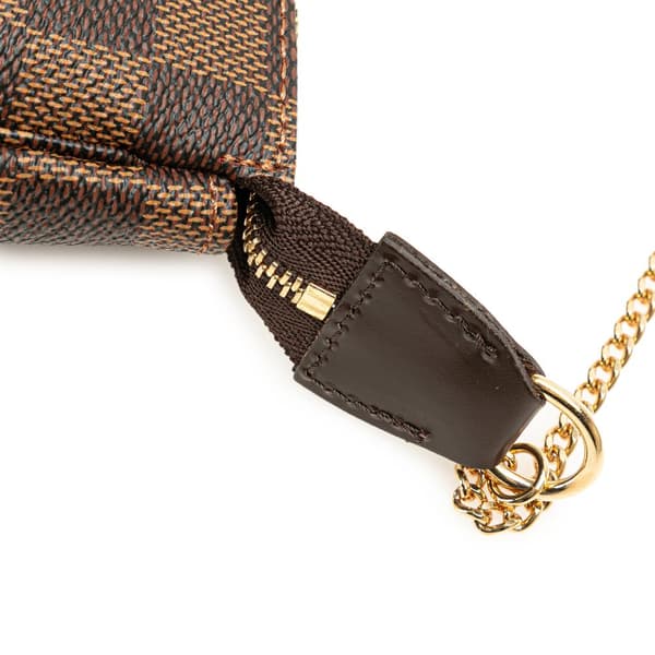 Pre-owned Louis Vuitton Damier Ebene Mini Pochette Accessoires Brown
