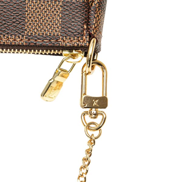 Pre-owned Louis Vuitton Damier Ebene Mini Pochette Accessoires Brown