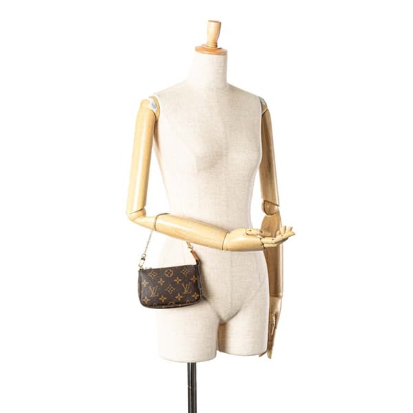 Pre-owned Louis Vuitton Monogram Mini Pochette Accessoires Brown