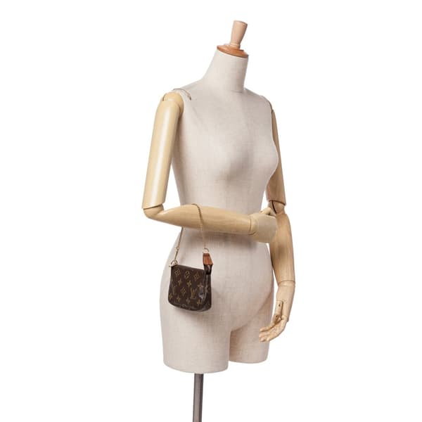 Pre-owned Louis Vuitton Monogram Mini Pochette Accessoires Brown