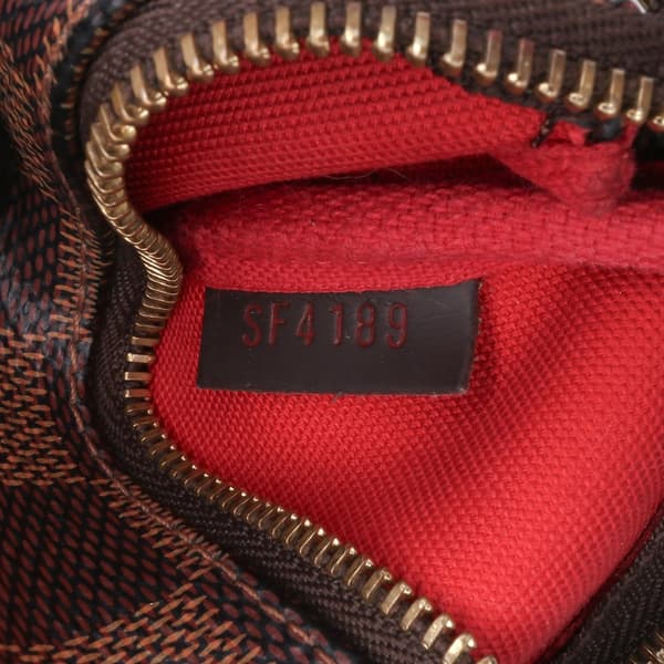 Pre-owned Louis Vuitton Damier Ebene Mini Pochette Accessoires Brown