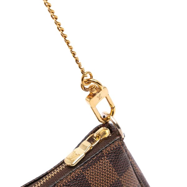 Pre-owned Louis Vuitton Damier Ebene Mini Pochette Accessoires Brown