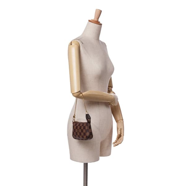 Pre-owned Louis Vuitton Damier Ebene Mini Pochette Accessoires Brown