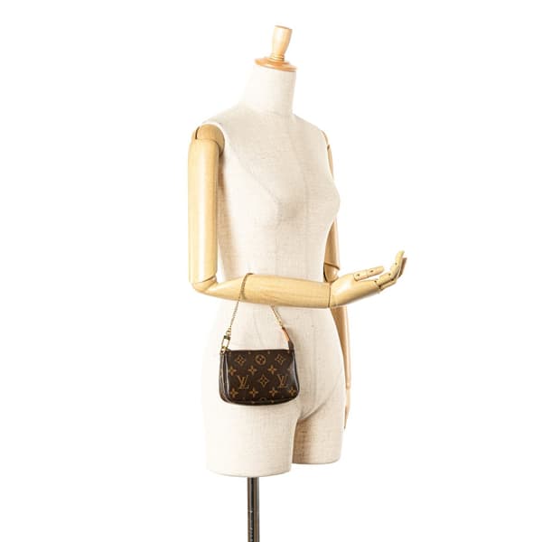 Pre-owned Louis Vuitton Monogram Mini Pochette Accessoires Brown
