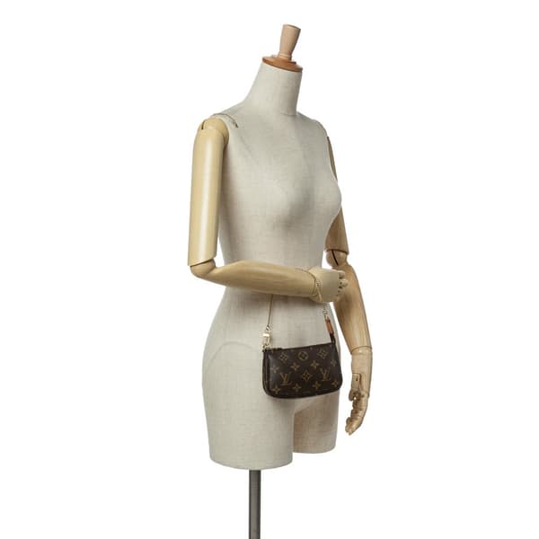 Pre-owned Louis Vuitton Monogram Mini Pochette Accessoires Brown