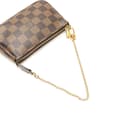 Miniatyrbild 10 av 10: Pre-owned Louis Vuitton Damier Ebene Mini Pochette Accessoires Brown