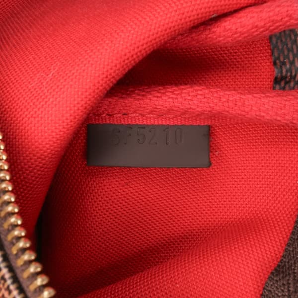 Pre-owned Louis Vuitton Damier Ebene Mini Pochette Accessoires Brown