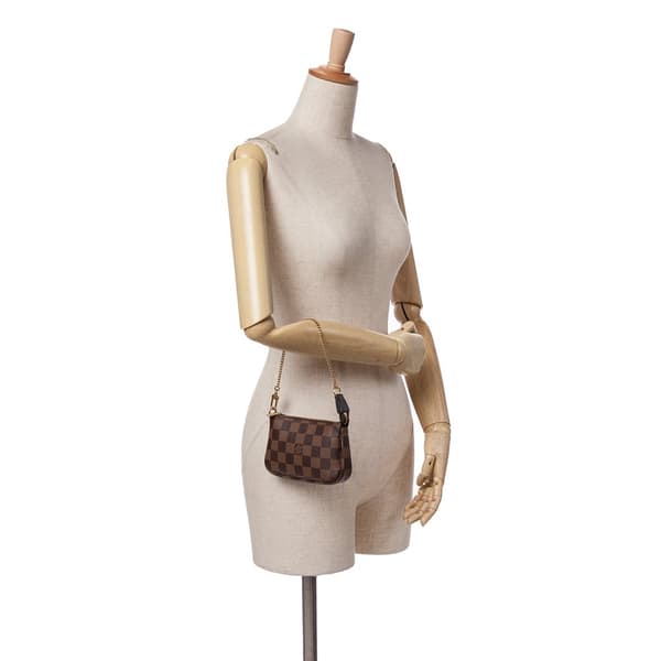 Pre-owned Louis Vuitton Damier Ebene Mini Pochette Accessoires Brown