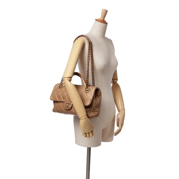 Pre-owned Chanel Medium Glazed Calfskin Castle Rock Top Handle Flap Brown