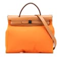 Miniatyrbild 1 av 10: Pre-owned Hermès Toile Herbag Zip 31 Orange
