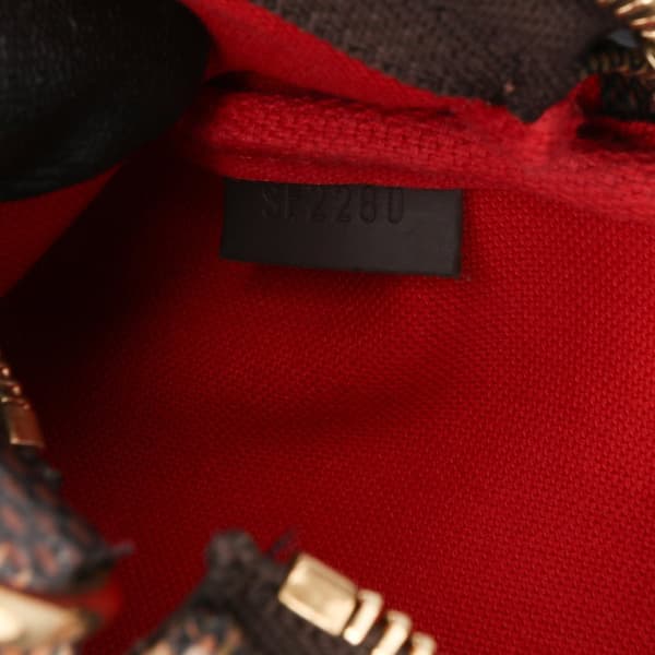 Pre-owned Louis Vuitton Damier Ebene Mini Pochette Accessoires Brown