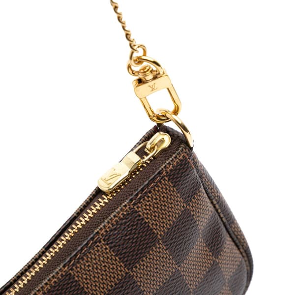 Pre-owned Louis Vuitton Damier Ebene Mini Pochette Accessoires Brown