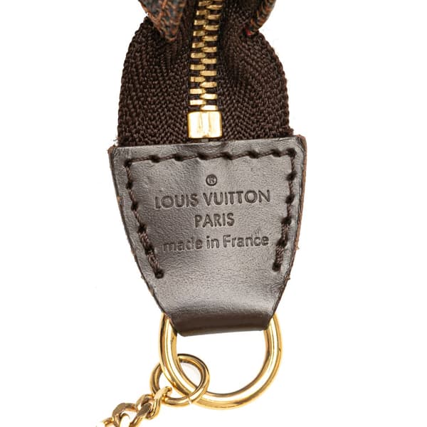 Pre-owned Louis Vuitton Damier Ebene Mini Pochette Accessoires Brown