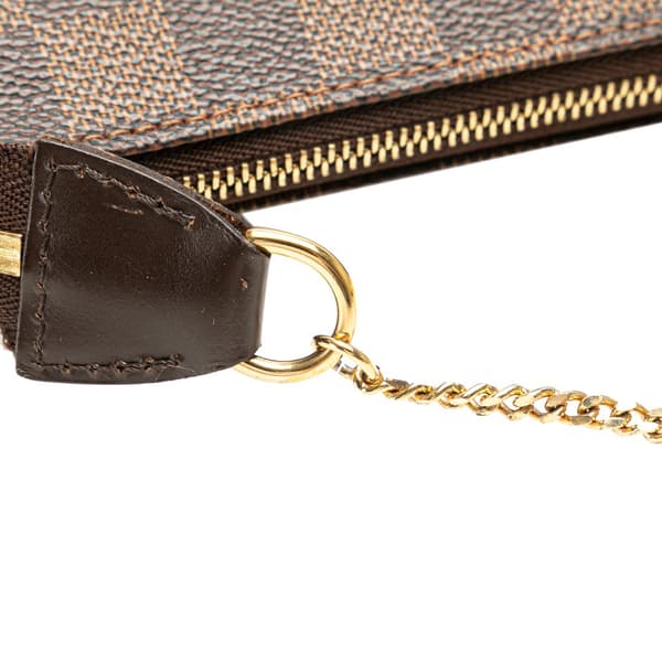 Pre-owned Louis Vuitton Damier Ebene Mini Pochette Accessoires Brown