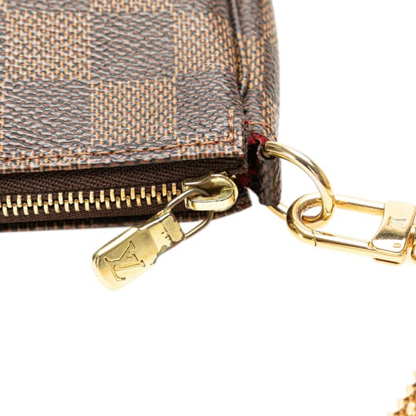 Pre-owned Louis Vuitton Damier Ebene Mini Pochette Accessoires Brown