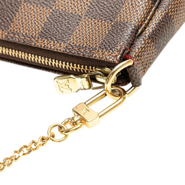 Pre-owned Louis Vuitton Damier Ebene Mini Pochette Accessoires Brown