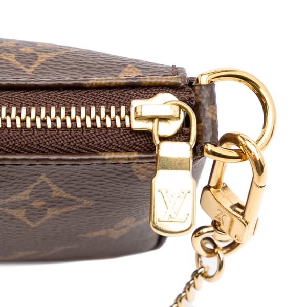 Pre-owned Louis Vuitton Monogram Mini Pochette Accessoires Brown