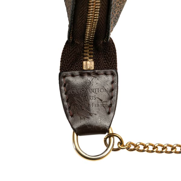 Pre-owned Louis Vuitton Damier Ebene Mini Pochette Accessoires Brown