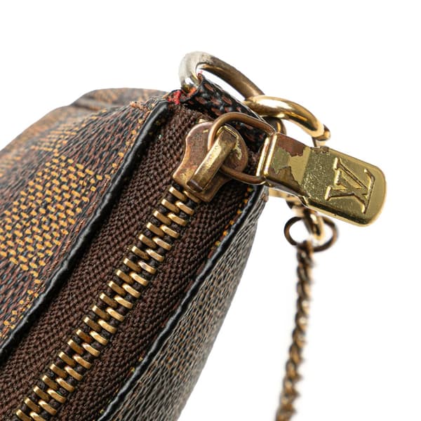 Pre-owned Louis Vuitton Damier Ebene Mini Pochette Accessoires Brown