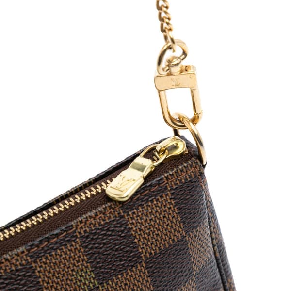 Pre-owned Louis Vuitton Damier Ebene Mini Pochette Accessoires Brown