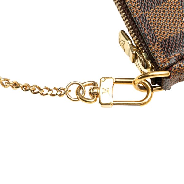 Pre-owned Louis Vuitton Damier Ebene Mini Pochette Accessoires Brown
