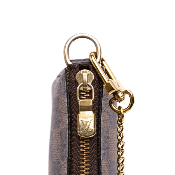 Pre-owned Louis Vuitton Damier Ebene Mini Pochette Accessoires Brown