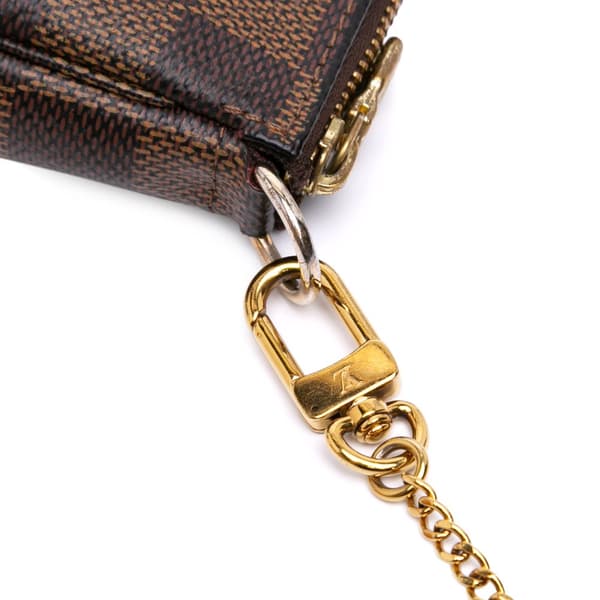 Pre-owned Louis Vuitton Damier Ebene Mini Pochette Accessoires Brown