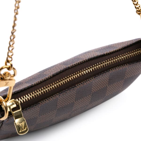 Pre-owned Louis Vuitton Damier Ebene Mini Pochette Accessoires Brown