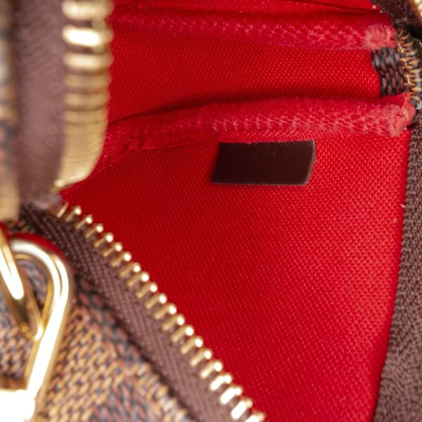 Pre-owned Louis Vuitton Damier Ebene Mini Pochette Accessoires Brown
