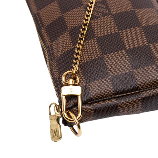 Pre-owned Louis Vuitton Damier Ebene Mini Pochette Accessoires Brown