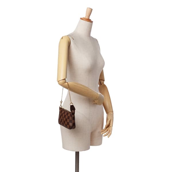 Pre-owned Louis Vuitton Damier Ebene Mini Pochette Accessoires Brown