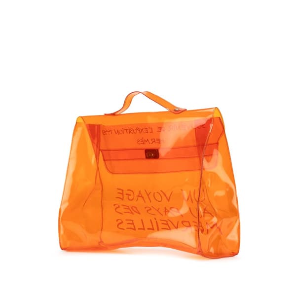 Pre-owned Hermès Vinyl Souvenir De L Exposition Kelly Handbag Orange