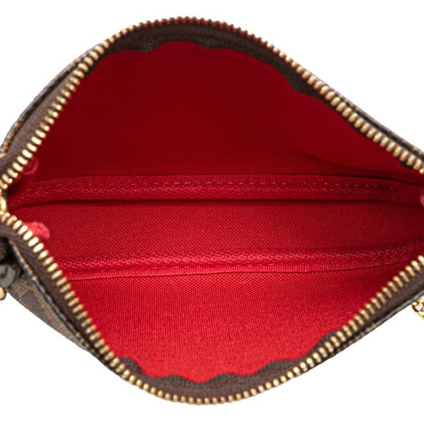Pre-owned Louis Vuitton Damier Ebene Mini Pochette Accessoires Brown
