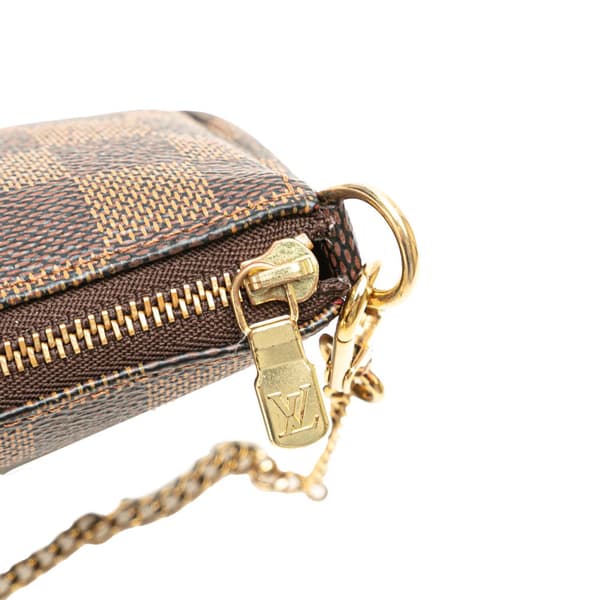 Pre-owned Louis Vuitton Damier Ebene Mini Pochette Accessoires Brown