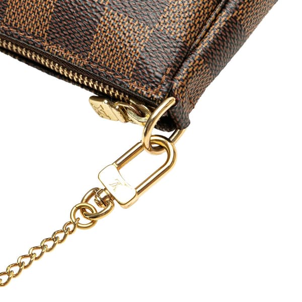 Pre-owned Louis Vuitton Damier Ebene Mini Pochette Accessoires Brown