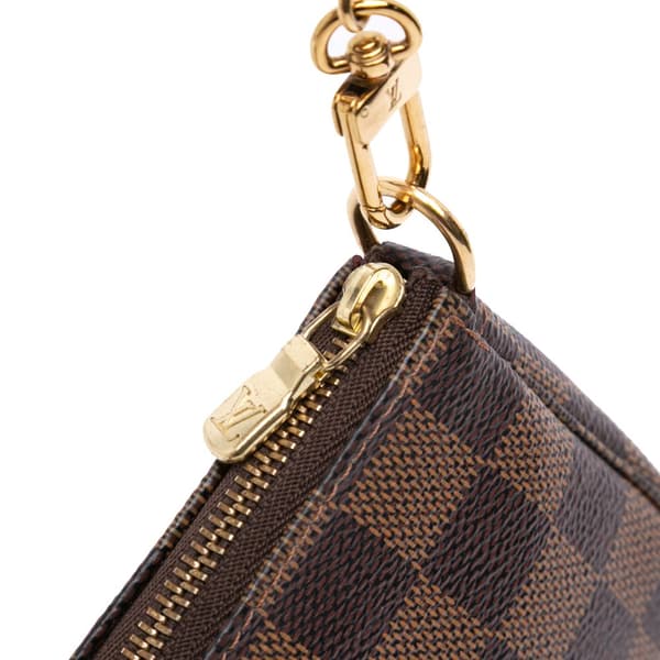 Pre-owned Louis Vuitton Damier Ebene Mini Pochette Accessoires Brown