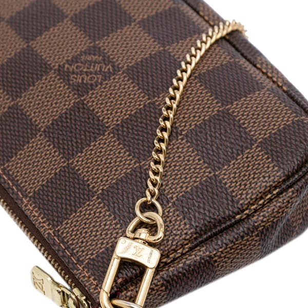 Pre-owned Louis Vuitton Damier Ebene Mini Pochette Accessoires Brown